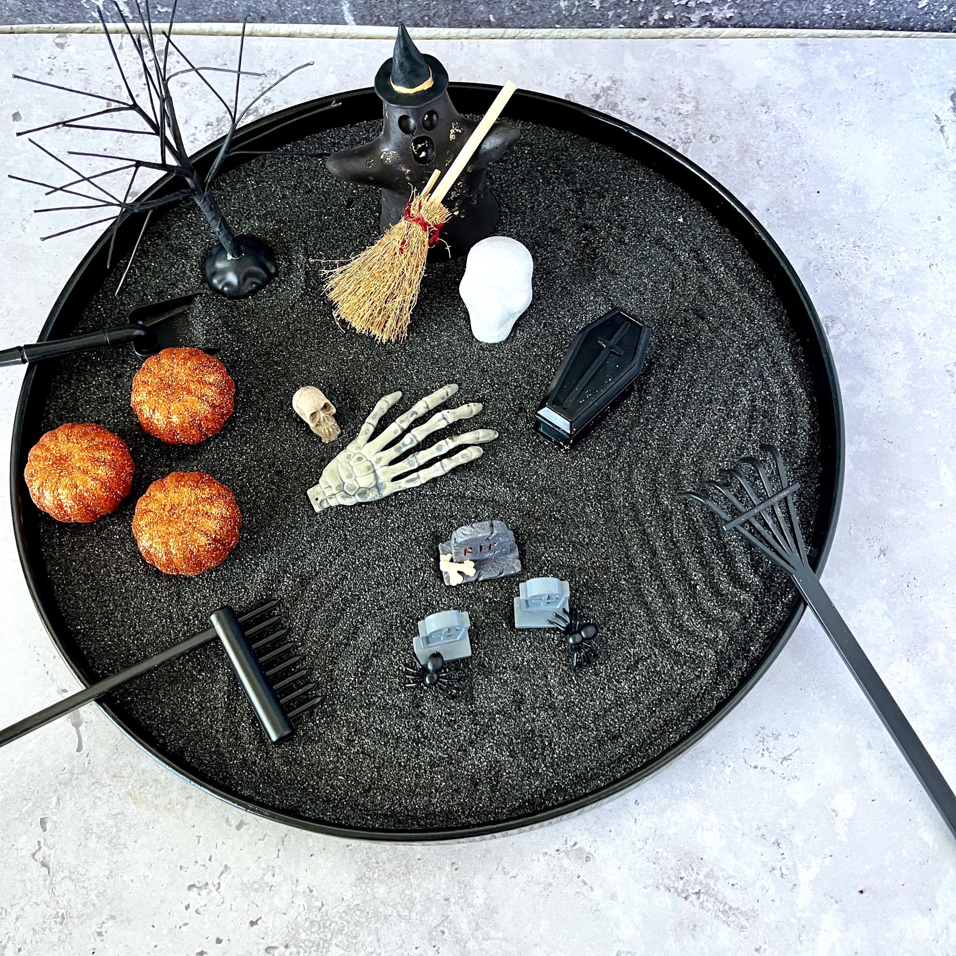 Black sand Halloween meditation garden display